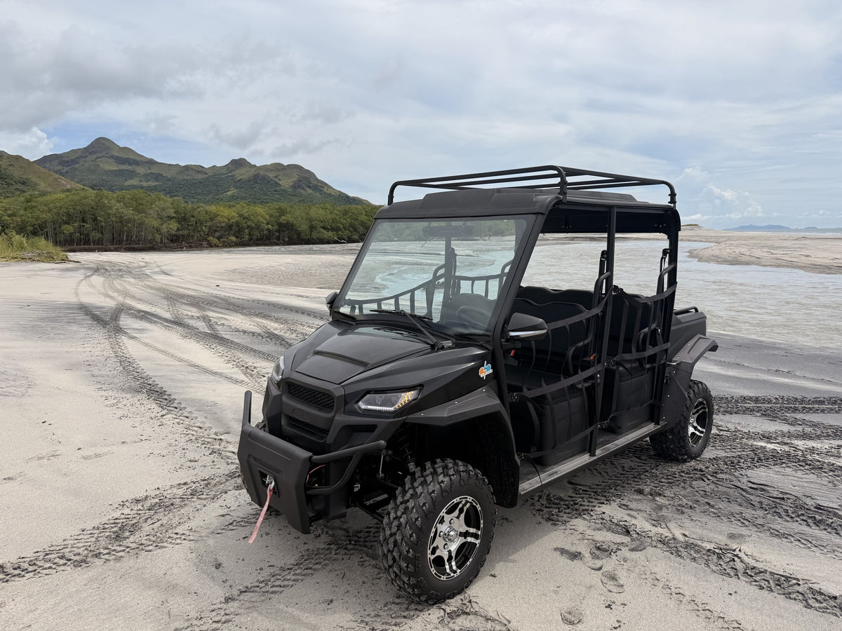 Trek UTV Eléctrico 4x4 con winche delantero en arena de playa