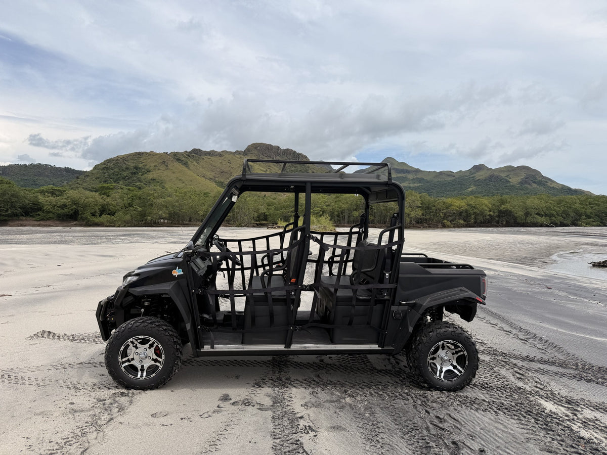 Trek UTV Eléctrico 4x4 Life Power de perfil en la playa
